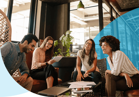 Team members sat together in a meeting.