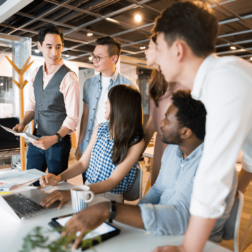 Group members working together in a office.